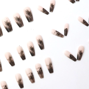 Ink line art press-on nails with butterfly and rose pattern in pink black gradient