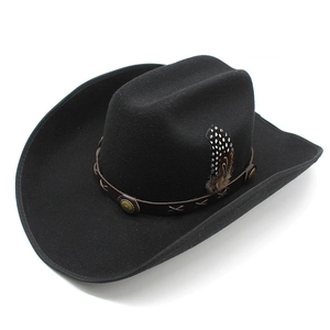 Detail of black wool cowboy hat with leather band, metal studs and spotted feather