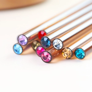 Japanese style acrylic nail art brush set with amber handles and colorful crystal gems