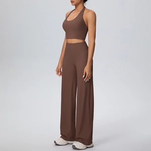 Detailed side view of brown halter neck sports bra and wide-leg yoga pants set
