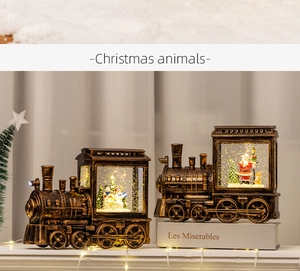 Vintage bronze Christmas train snow globe lights featuring Santa and snowman figures