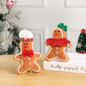 Plush gingerbread man Christmas ornaments with chef hat and bow tie for holiday decor