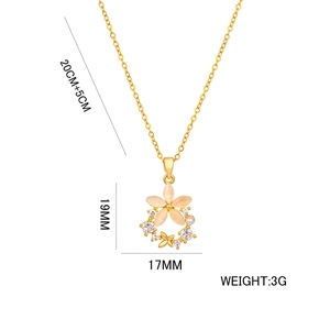 Elegant gold flower necklace with opal and zircon pendant on a white background