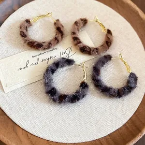 Retro leopard print faux fur round hoop earrings in brown and grey with gold hooks
