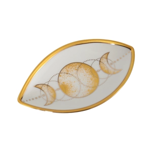 Oval ceramic jewelry tray featuring gold triple moon goddess design and metallic rim