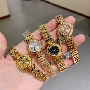 Set of minimalist women quartz watches with metal link straps in gold and silver tones