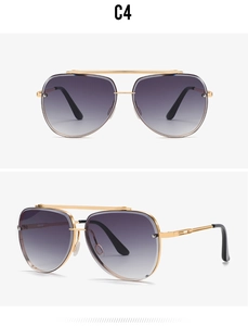 Detail view of gold metal aviator sunglasses with dual bridge and gradient purple lenses