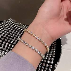 Elegant adjustable bracelets with teardrop cubic zirconia in gold and silver finish