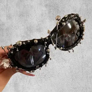 Street punk oversized sunglasses with silver rivet spikes on glossy black resin frames