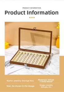 Detail view of walnut wood jewelry box with 12 slots for pearl necklace storage