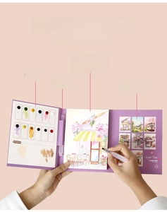Detail of portable watercolor set with 12 paints, brushes, and folding purple palette