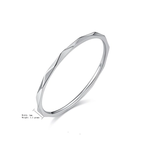 Detailed view of minimalist 1mm silver rhombus thin ring with faceted stackable design