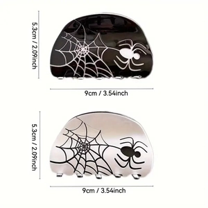 Spider web acetate hair claw clips in black and white colors with size measurements