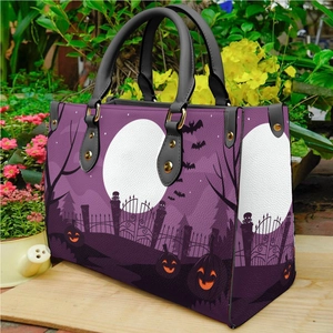 Halloween purple tote bag with bat, moon and pumpkin prints on faux leather