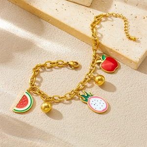 Golden stainless steel bracelet featuring vibrant enamel watermelon and dragon fruit charms