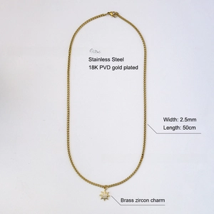 Macro view of 18K PVD gold plated stainless steel chain with a zircon star pendant