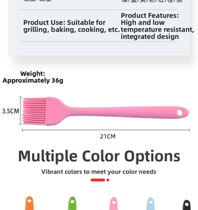 Detailed view of pink silicone oil brush with dimensions 21cm by 3.5cm for baking