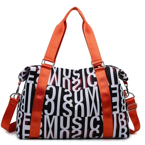 Large capacity travel duffel bag with music letter print and orange handles