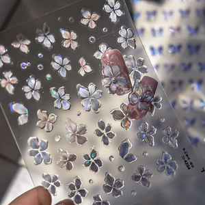 Detailed 5D relief floral nail stickers with aurora laser finish on soft pink nails
