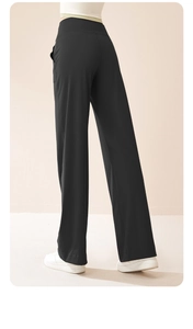 Rear view of high-waisted black yoga pants with invisible side pocket and elastic fabric