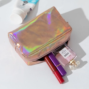 Detailed macro shot of a laser holographic PU makeup bag with sleek zipper closure