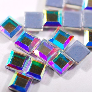 Macro shot of square AB iridescent flatback rhinestones for nail art and DIY crafts