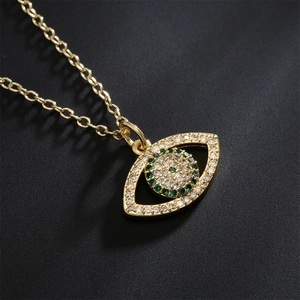 18K gold plated necklace with evil eye pendant featuring green and white crystals