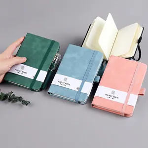 A6 portable strap notebooks in green, blue and pink with matte faux leather covers