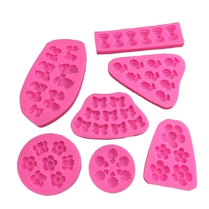 Pink silicone flower and bee molds set for cake decorating and plaster crafts