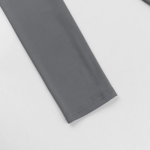 Detailed close-up of dark grey long sleeve cuffs with reinforced double-stitch sewing