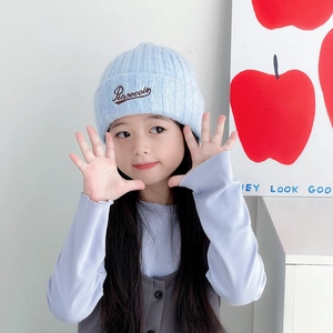 Light blue wool knit hat for children with Penvecole embroidery for winter warmth