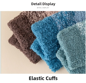 Macro detail of elastic cuffs on thick gradient coral fleece thermal sleeping socks