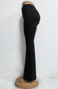 Side view of high-waisted black flared jeans showing slim fit and stretchy fabric