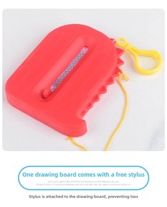 Detail of red magnetic drawing board for kids with a yellow pen and handy carabiner clip
