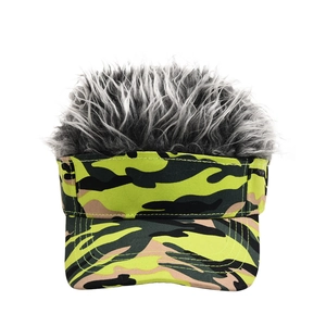 Detail view of the camouflage sun visor with long messy grey and white faux hair wig