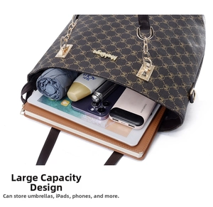 Deep brown tote bag with large interior showing storage for iPad, umbrella and essentials