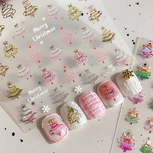 Golden Christmas tree nail art stickers with delicate lines and snowflakes on nails