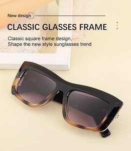 Detail of classic square sunglasses with black tea gradient frame and purple lenses