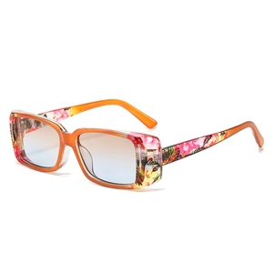 Retro square sunglasses with orange floral patchwork frame and blue-orange gradient lenses