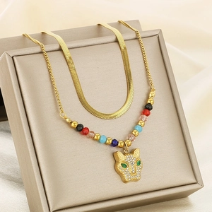 Double-layered snake bone chain necklace with colorful beads and crystal leopard head pendant