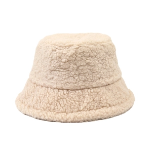 Solid color lamb wool bucket hat for winter featuring a fluffy plush texture in off-white
