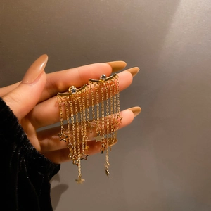Elegant gold star tassel earrings with rhinestone studs and long hanging chain pendants