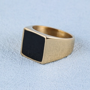Gold stainless steel square ring with black enamel inlay at 45 degree angle view