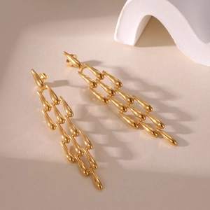 Minimalist long gold teardrop tassel earrings in 18K plated stainless steel style