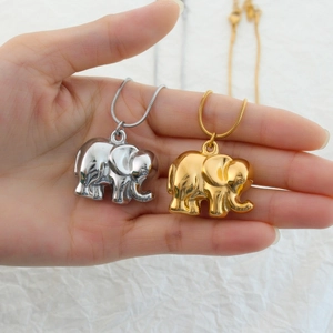 Minimalist 18K gold and silver elephant pendant necklaces with sleek snake chains