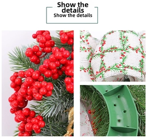 Detailed close-up of Christmas wreath with red berries, pine needles and ribbon