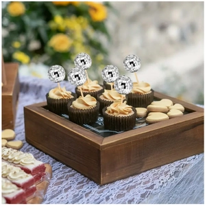 Silver mirror disco ball cake toppers on cupcakes for festive party decoration