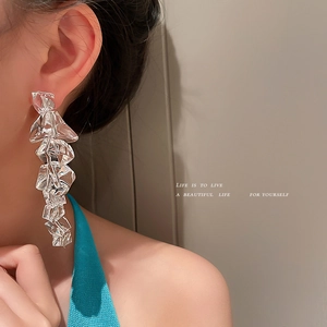 Irregular silver-plated acrylic ice drop earrings with long crinkled metal leaf texture