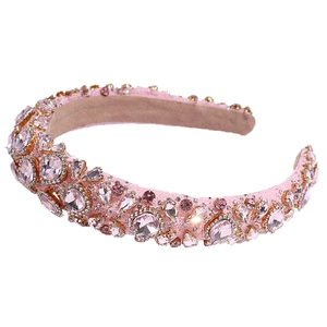 Luxurious pink padded headband with sparkling crystals and beads on a rose gold base
