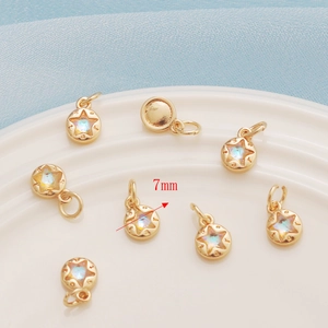 Detailed view of 14K gold-plated 7mm star charm with rainbow zircon for jewelry making